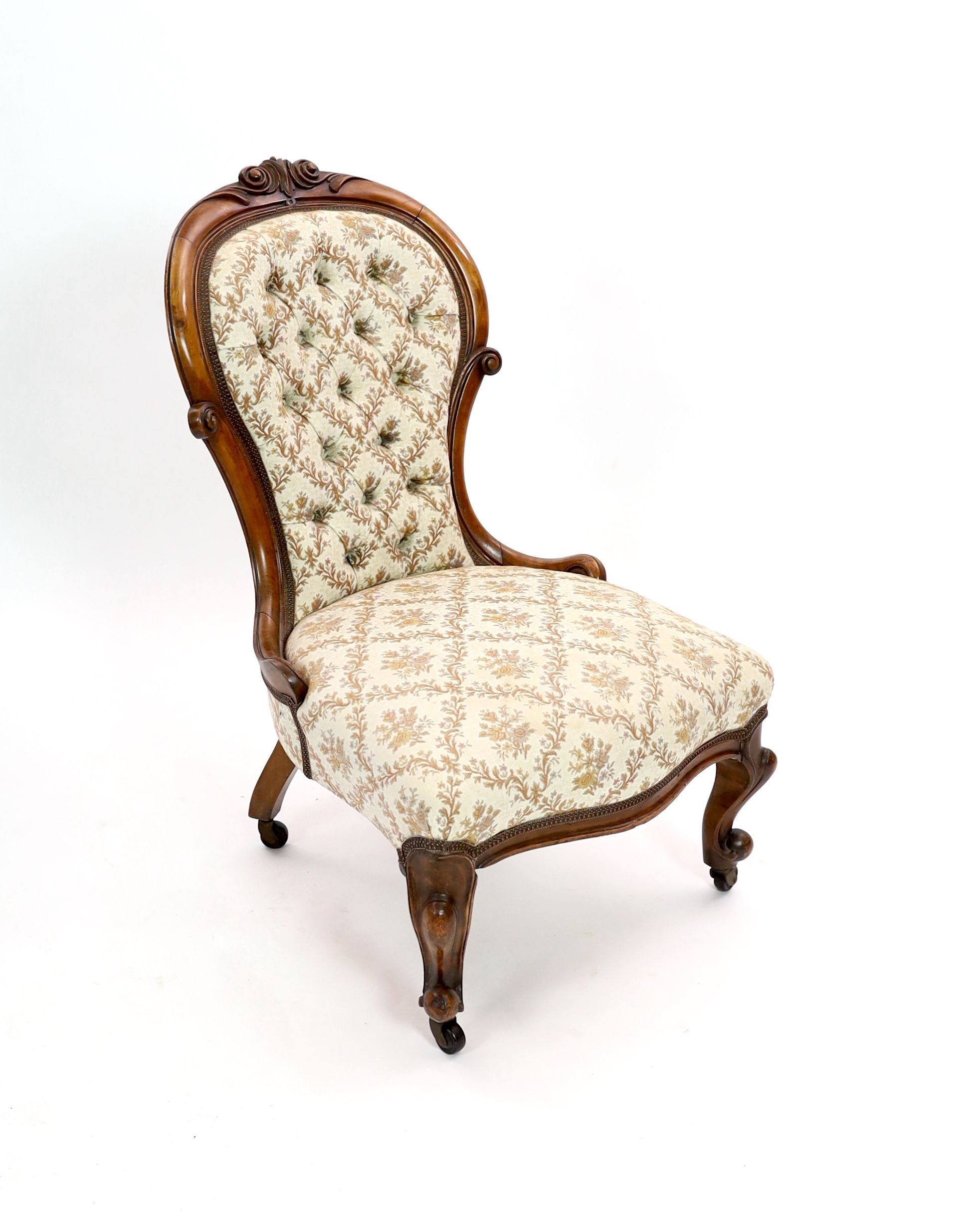 A Victorian walnut spoonback nursing chair, width 57cm depth 68cm height 96cm